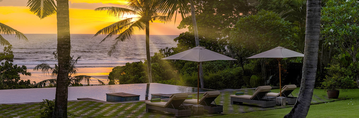 Villa Kailasha - dramatic sunset from pool